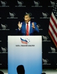 Dr. Michael A. Youssef speaking at the podium